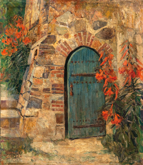 Green door in a stone wall with orange lilies