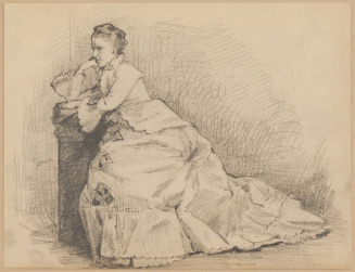 Seated woman with hand to chin