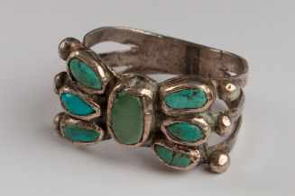 Silver Ring with Seven Turquoise Stones in Butterfly Pattern