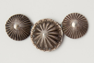 Three Conchos or Buttons on a Bar