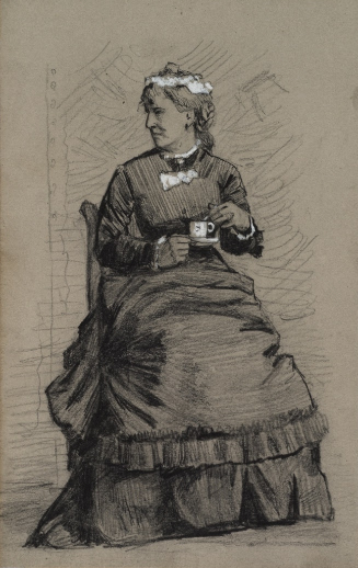 Seated woman holding teacup
