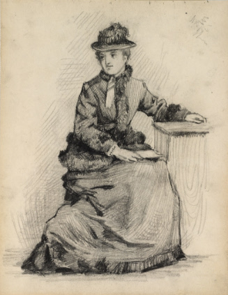 Woman seated with hand on table