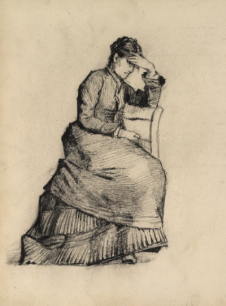 Woman seated in chair holding her hand to brow